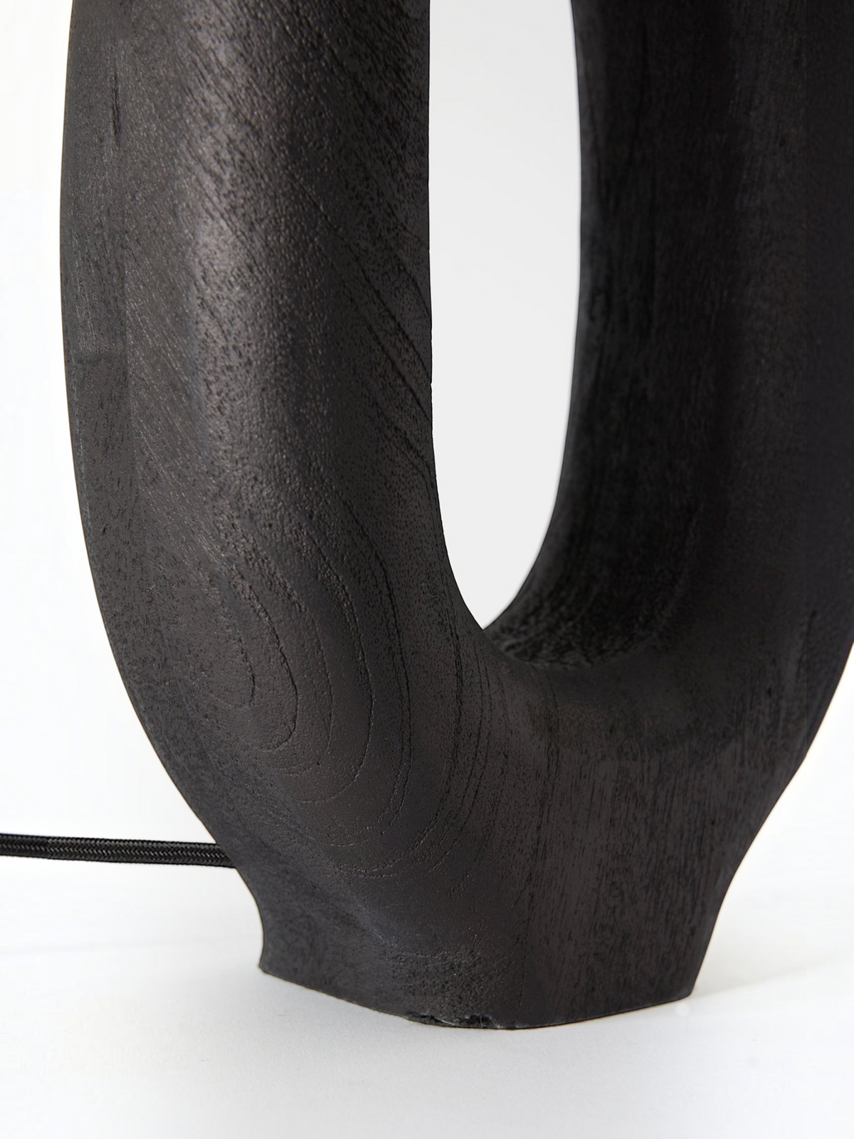 Lyckåsen Qvist 408 black sandblasted wooden table lamp with a sculptural, balanced form and visible wood grain.