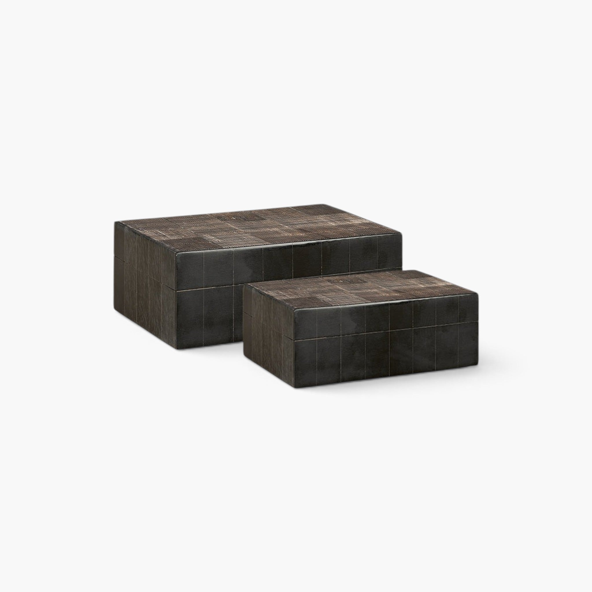 Lyckåsen Avorio 2-pack decorative storage boxes in dark textured resin, horn, and MDF with a unique grid pattern.