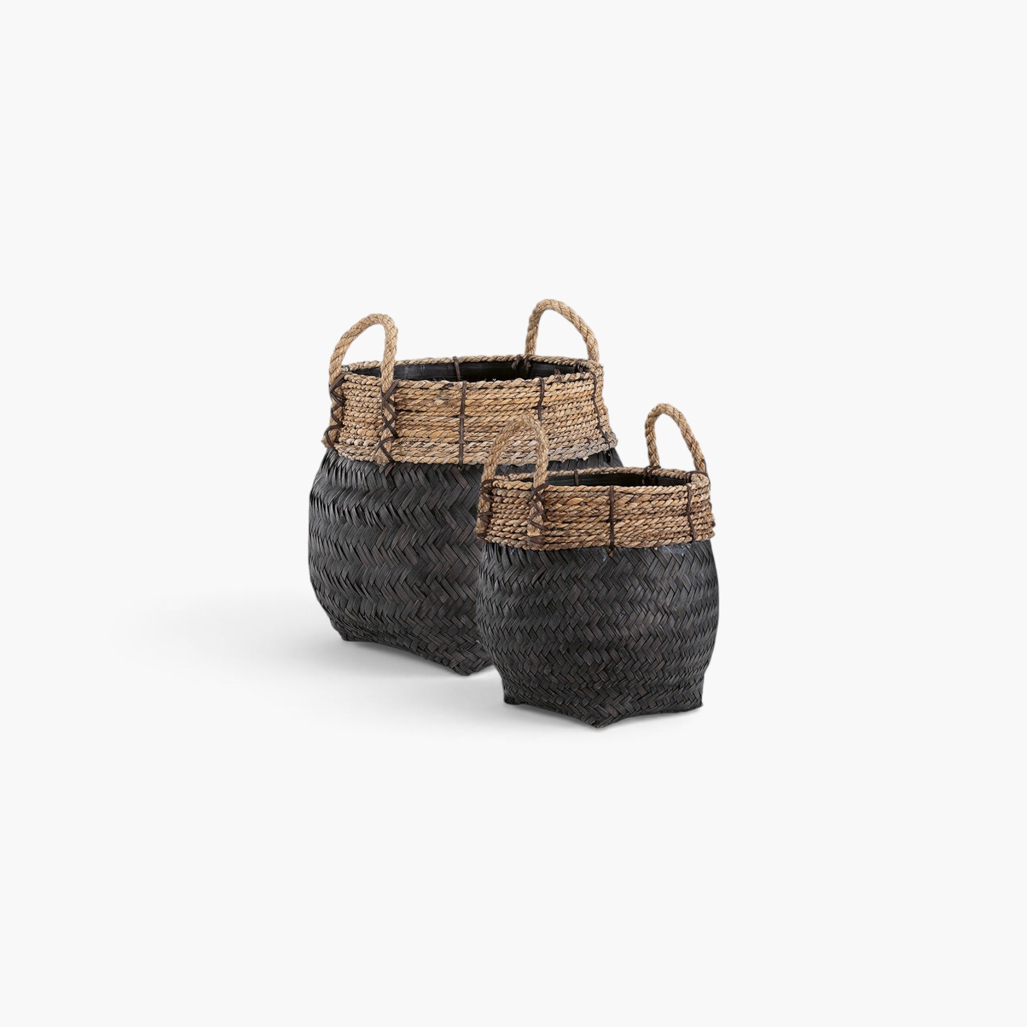 Lyckåsen Davao 2-pack round bamboo storage baskets with black herringbone pattern, rattan rim, and woven handles.