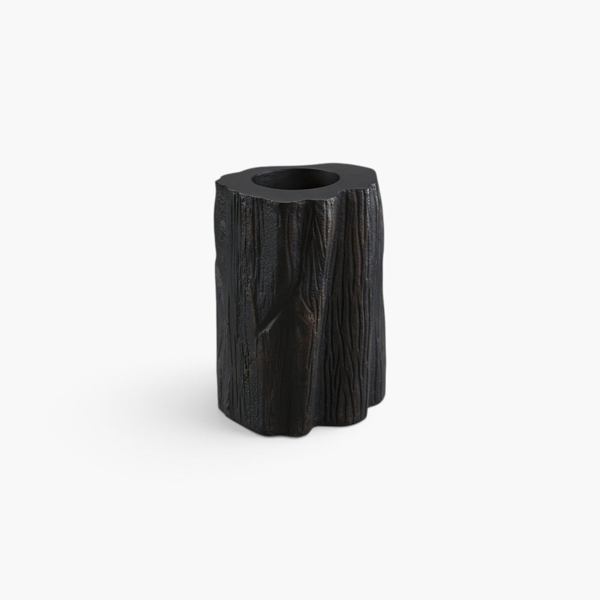 Lyckåsen Flame tealight candle holder in antique black and bronze metal with a textured wood-like finish.