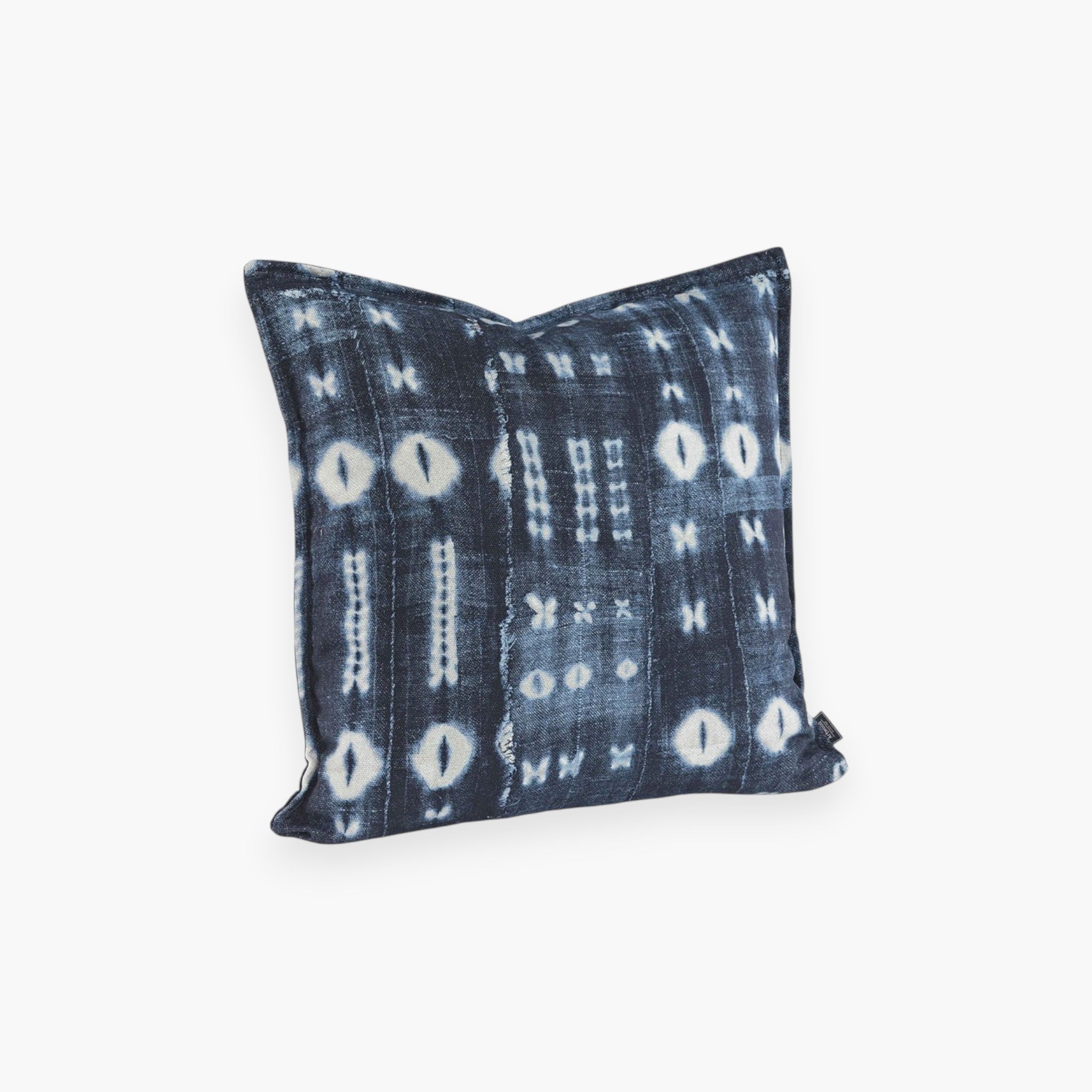 Lyckåsen indigo blue cushion cover with white batik-style pattern in a soft polyester and viscose blend.