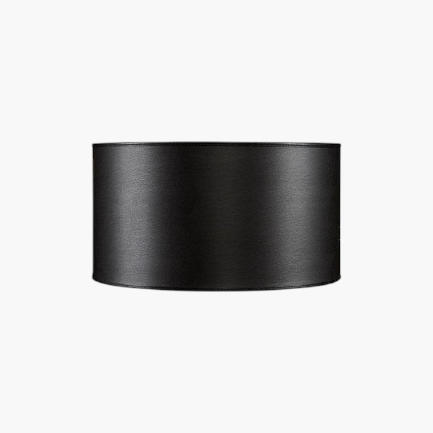 Lyckåsen Shade Cylinder lampshade in leather ebony, a sleek black drum-shaped fabric shade for table or floor lamps.