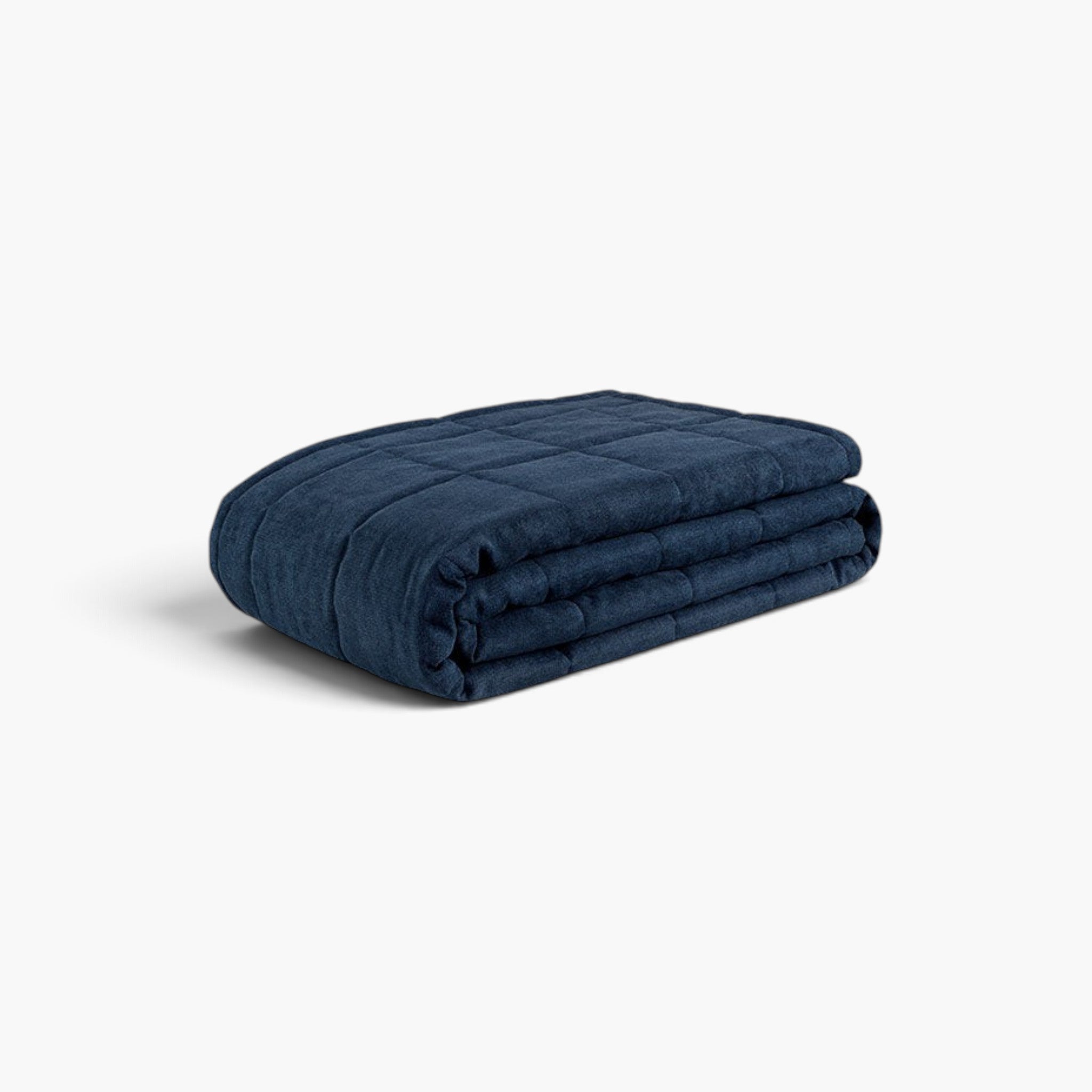 Lyckåsen Meghan deep blue hand-quilted polyester bedspread with a soft cotton blend backing for elegant bedroom decor.