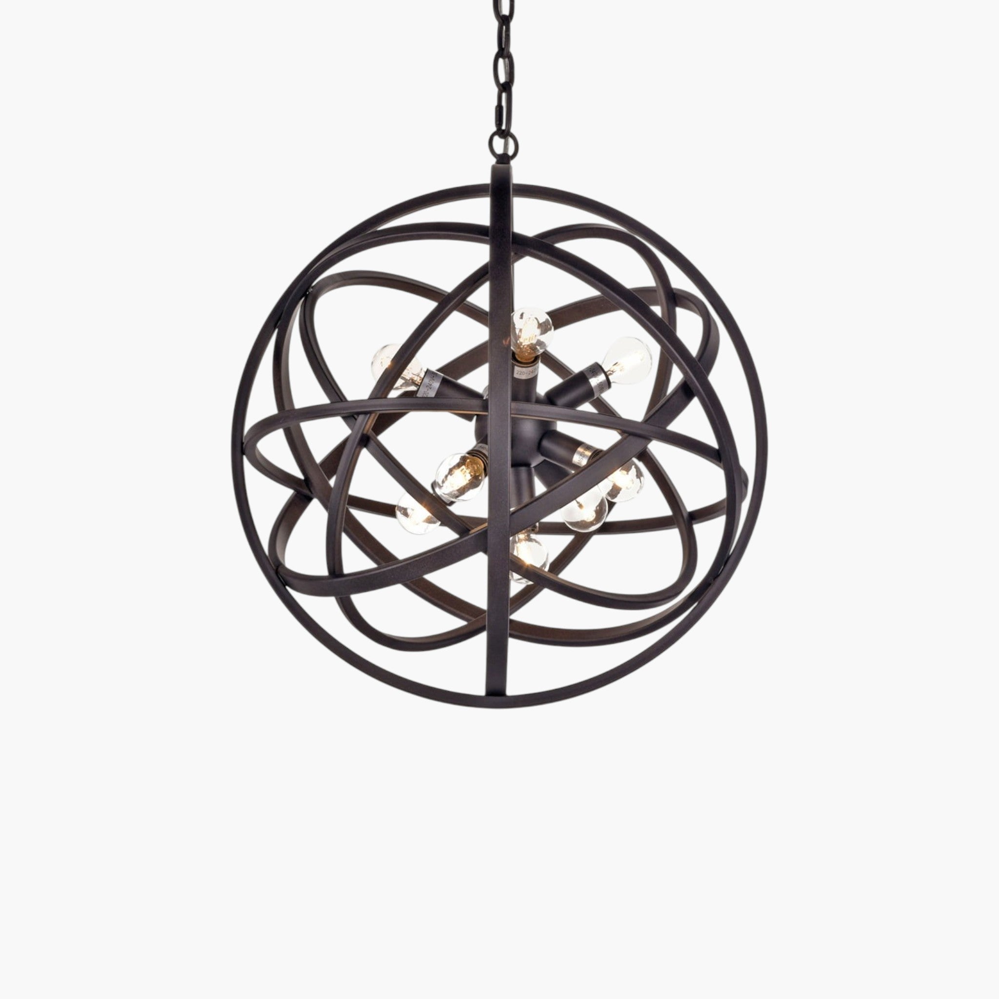 Lyckåsen Nest orb pendant light with a matte black metal frame and exposed Edison bulbs in a spherical design.