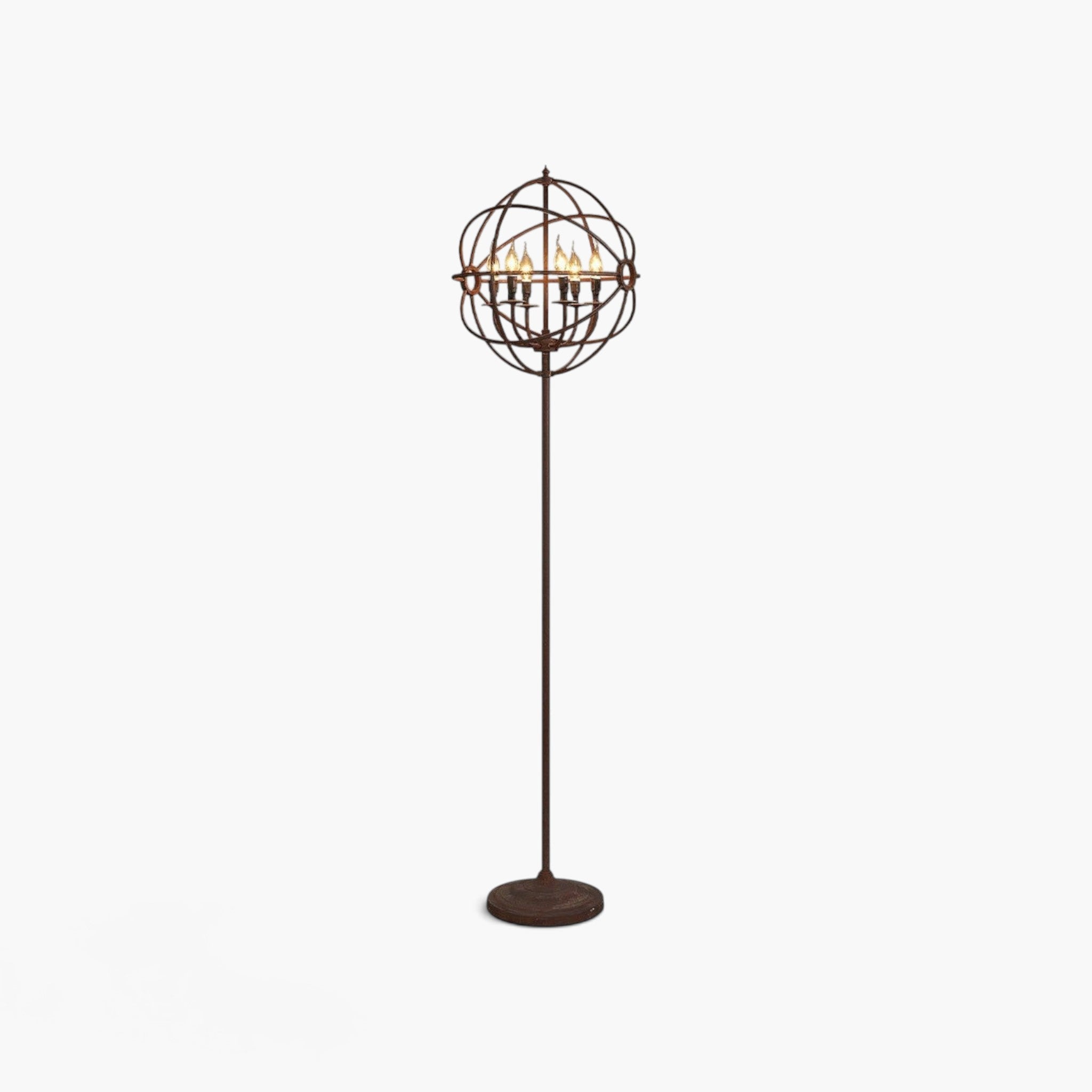 Lyckåsen Rome floor lamp in natural iron with a spherical metal frame and six glowing E14 candle-style light bulbs.