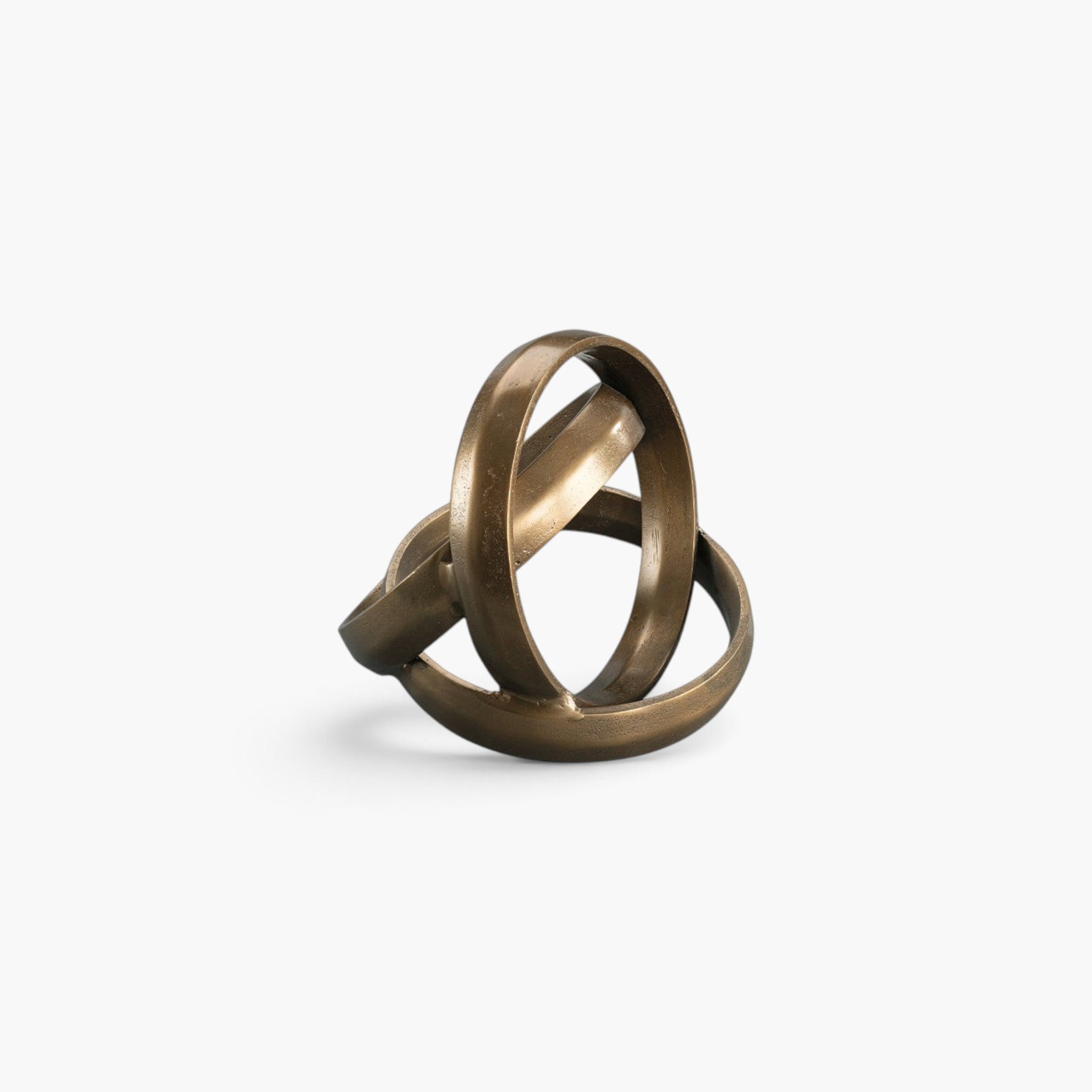 Lyckåsen Trinity decorative metal sculpture in antique brass with an elegant knotted circle design for home decor.
