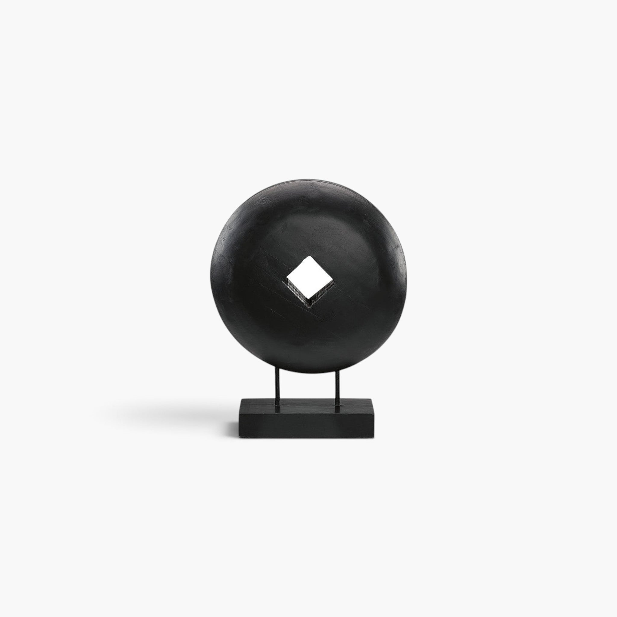 Lyckåsen Troya round black mango wood statue with a square center cutout on a rectangular base
