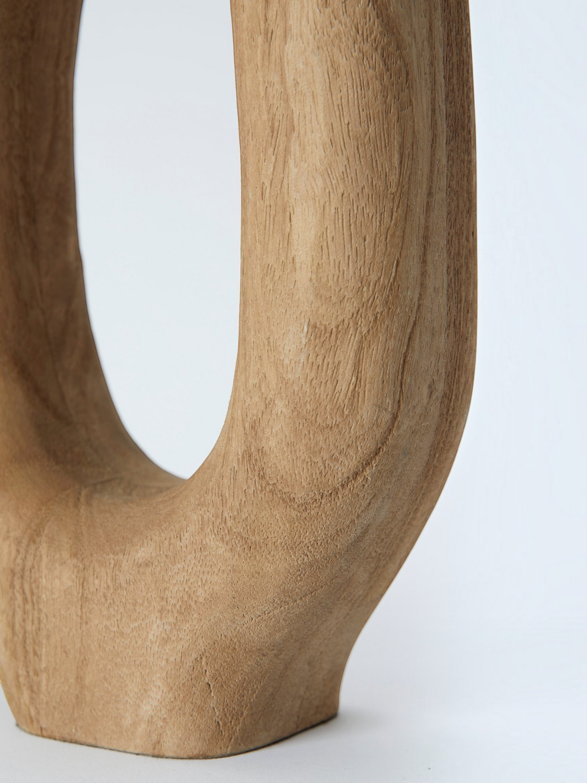 Lyckåsen Qvist 408 table lamp in light brown sandblasted natural wood with an organic sculptural shape.