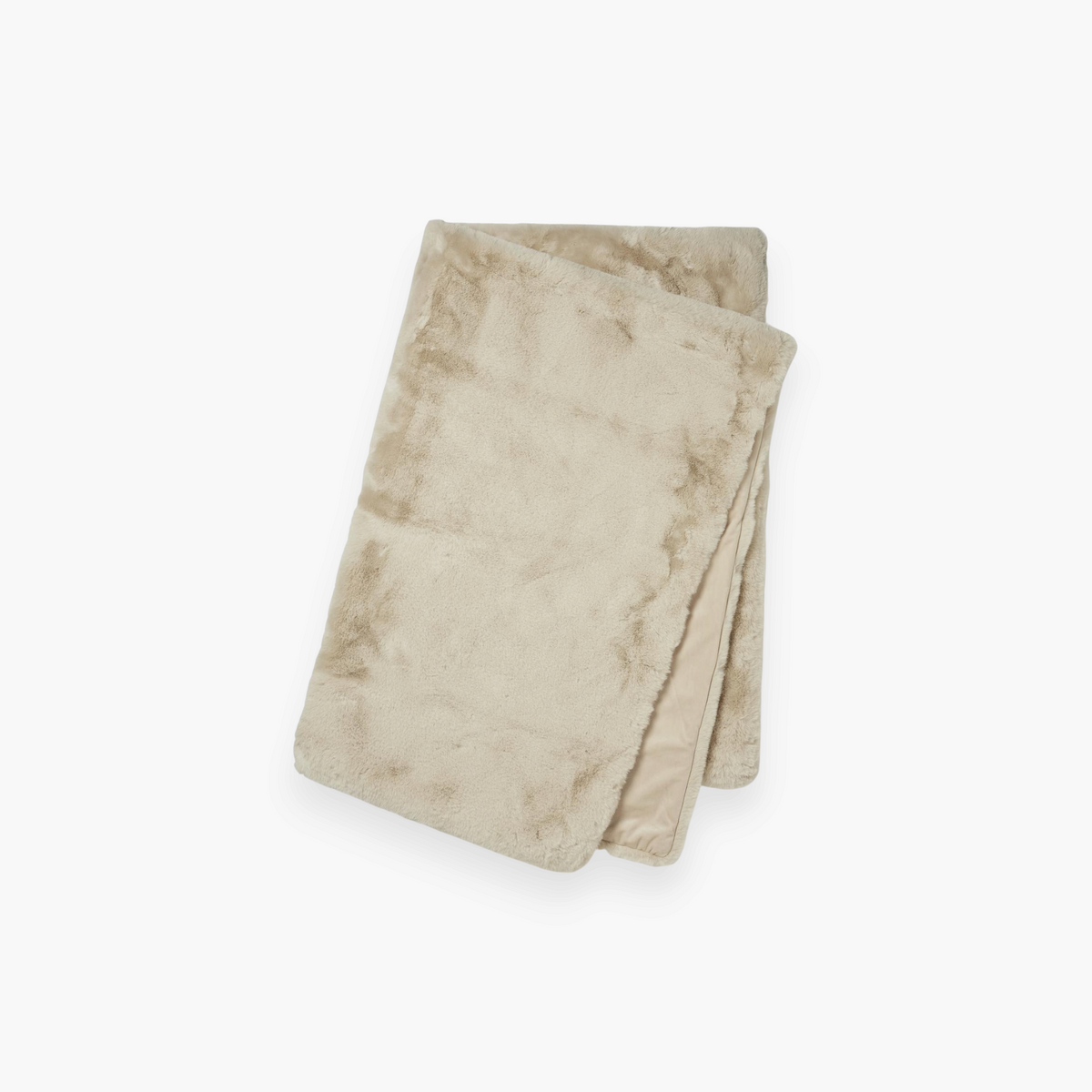 Lyckåsen beige faux fur throw blanket with a silky sheen and soft plush backing, folded for a cozy home aesthetic.