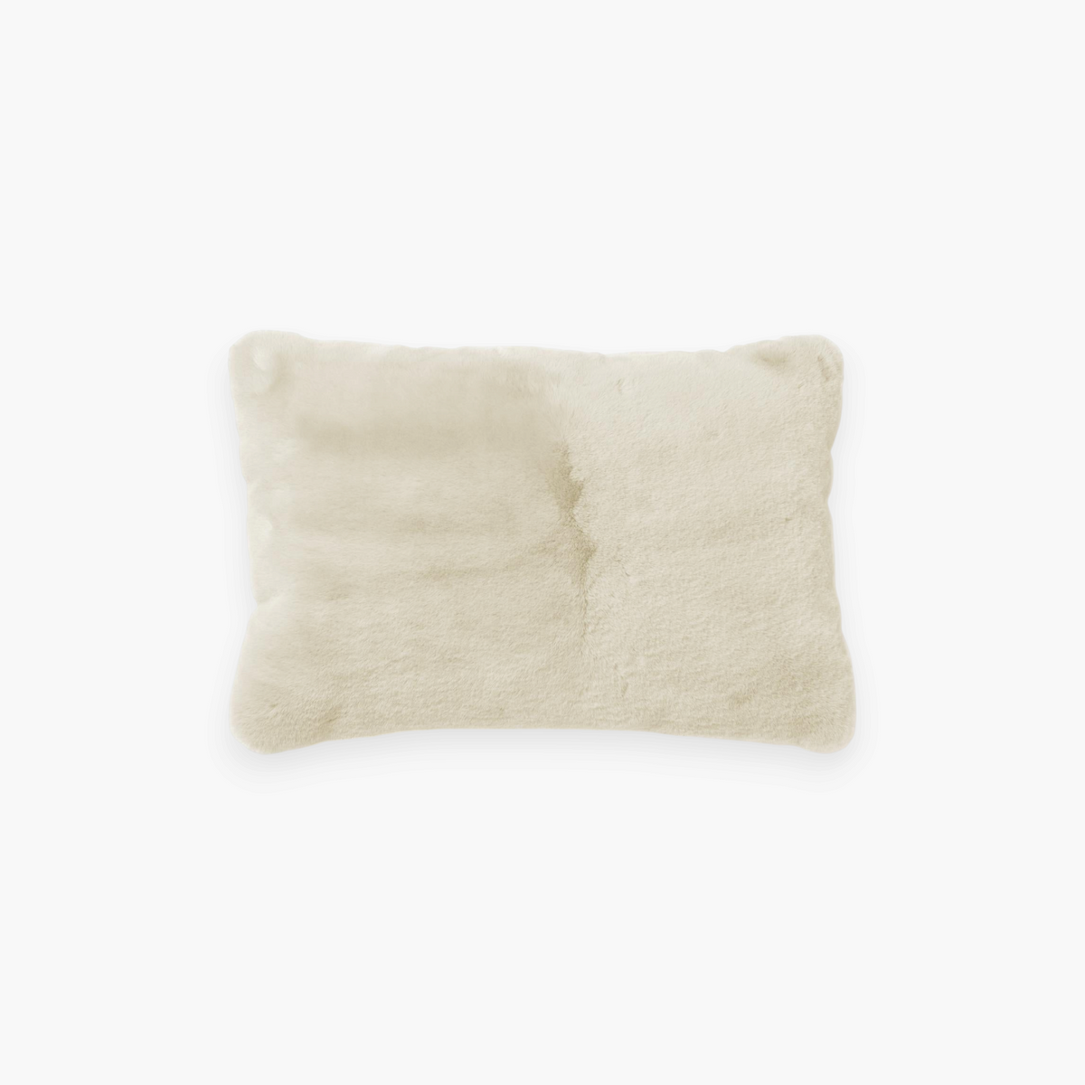Lyckåsen beige rectangular fluffy polyester cushion with a soft faux fur texture for a cozy home decor look.