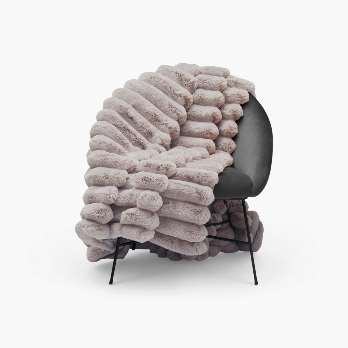 Lyckåsen Liny taupe polyester throw blanket with a soft, wide-striped textured pattern draped over a chair.