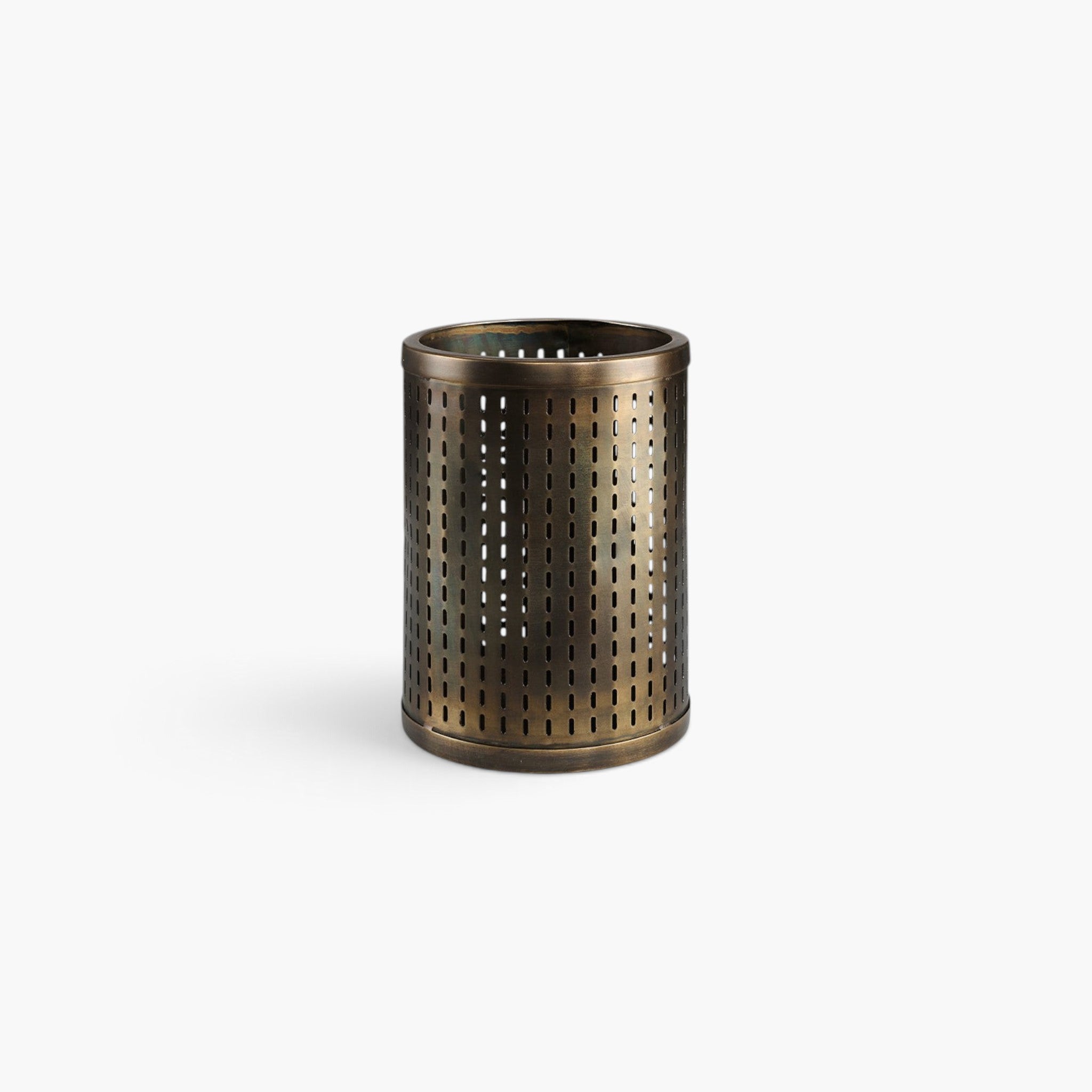 Lyckåsen Armando lantern in antique brass finish with a cylindrical perforated metal design for a warm glow.