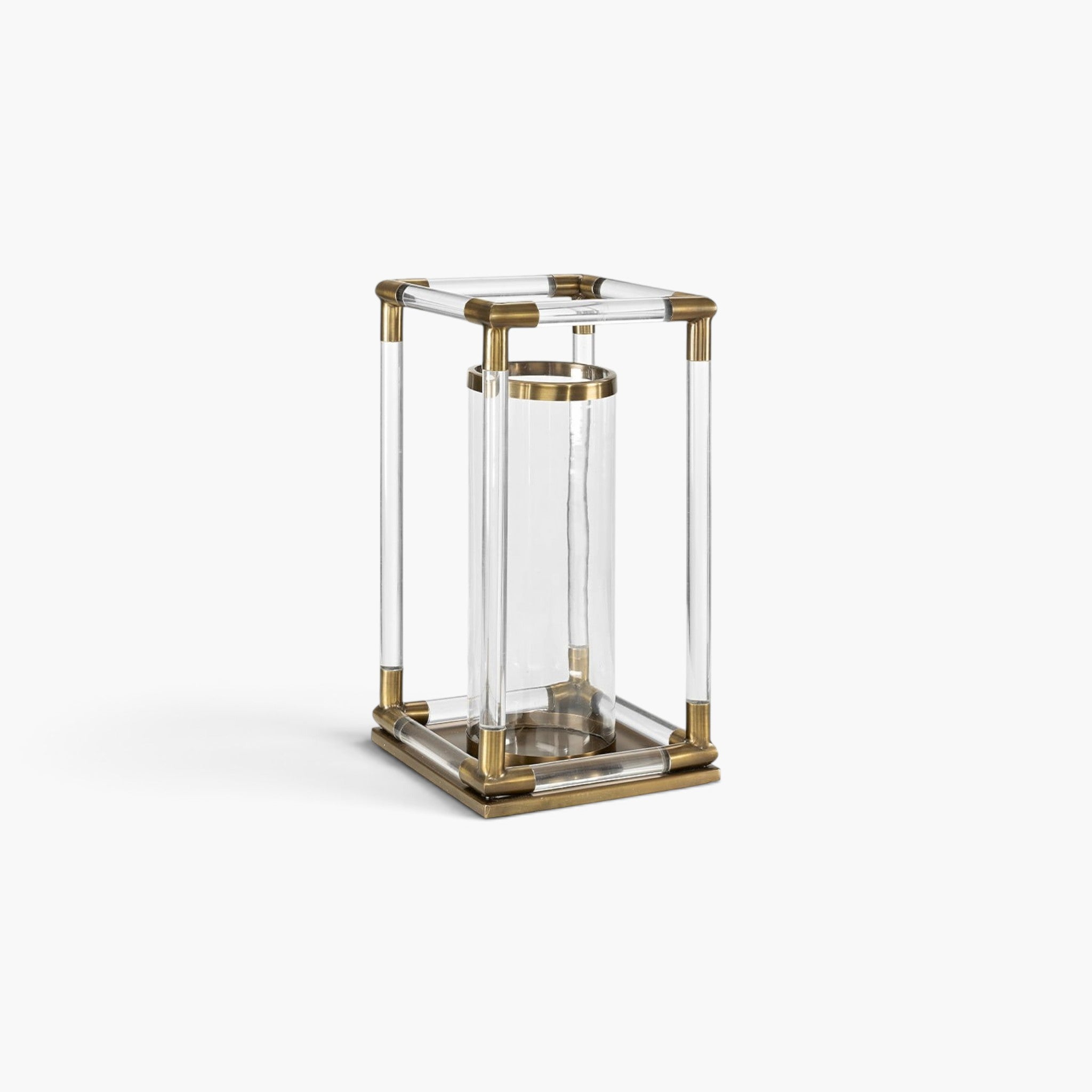 Lyckåsen Baltimore lantern in antique brass metal and clear plexiglass with a central hand-blown glass cylinder.