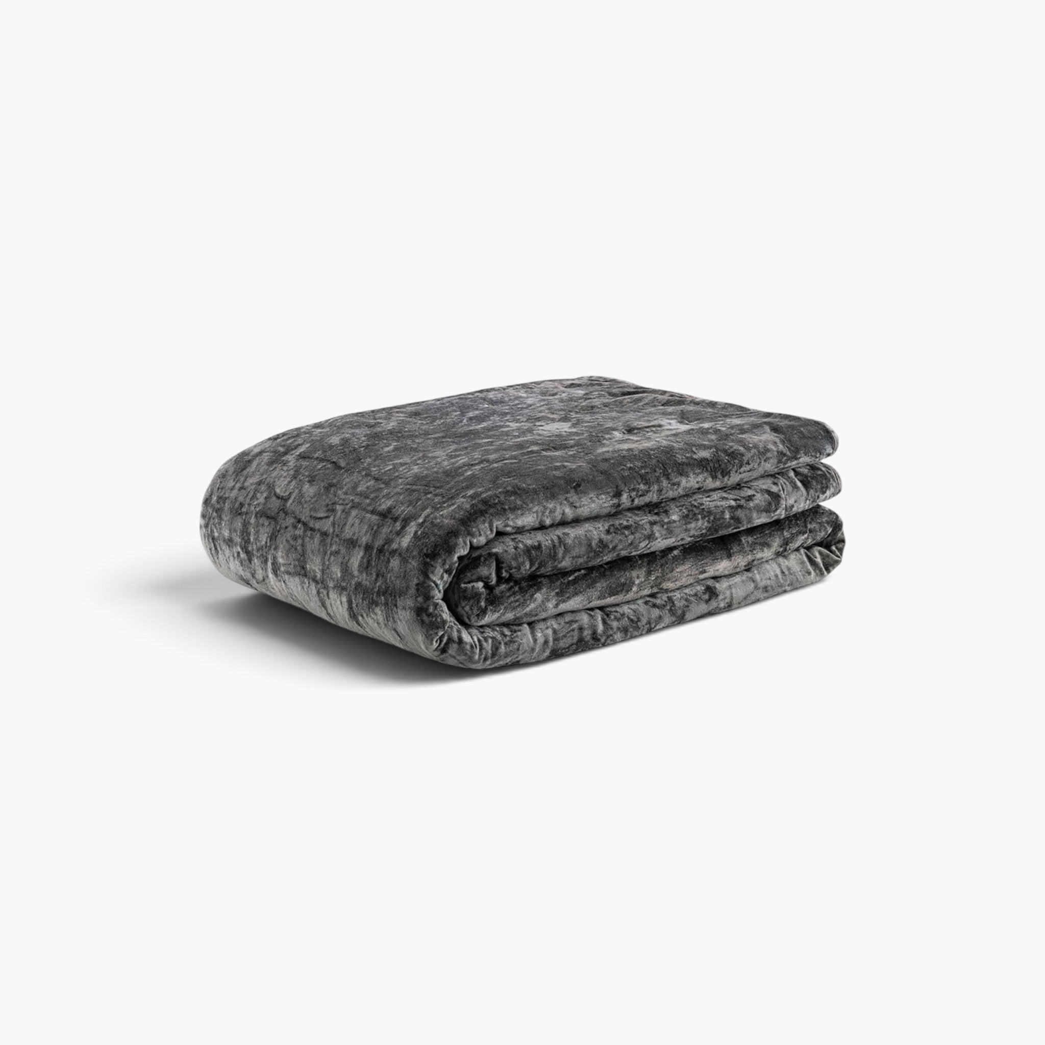 Lyckåsen Belize grey velvet bedspread with a washed finish and soft, elegant drape for a luxurious bedroom look.