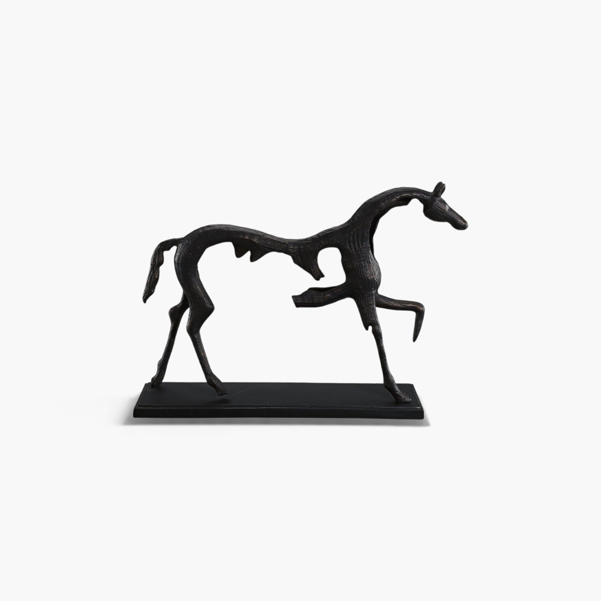 Lyckåsen Cavallo horse sculpture in antique black bronze metal with a textured finish on a rectangular base.