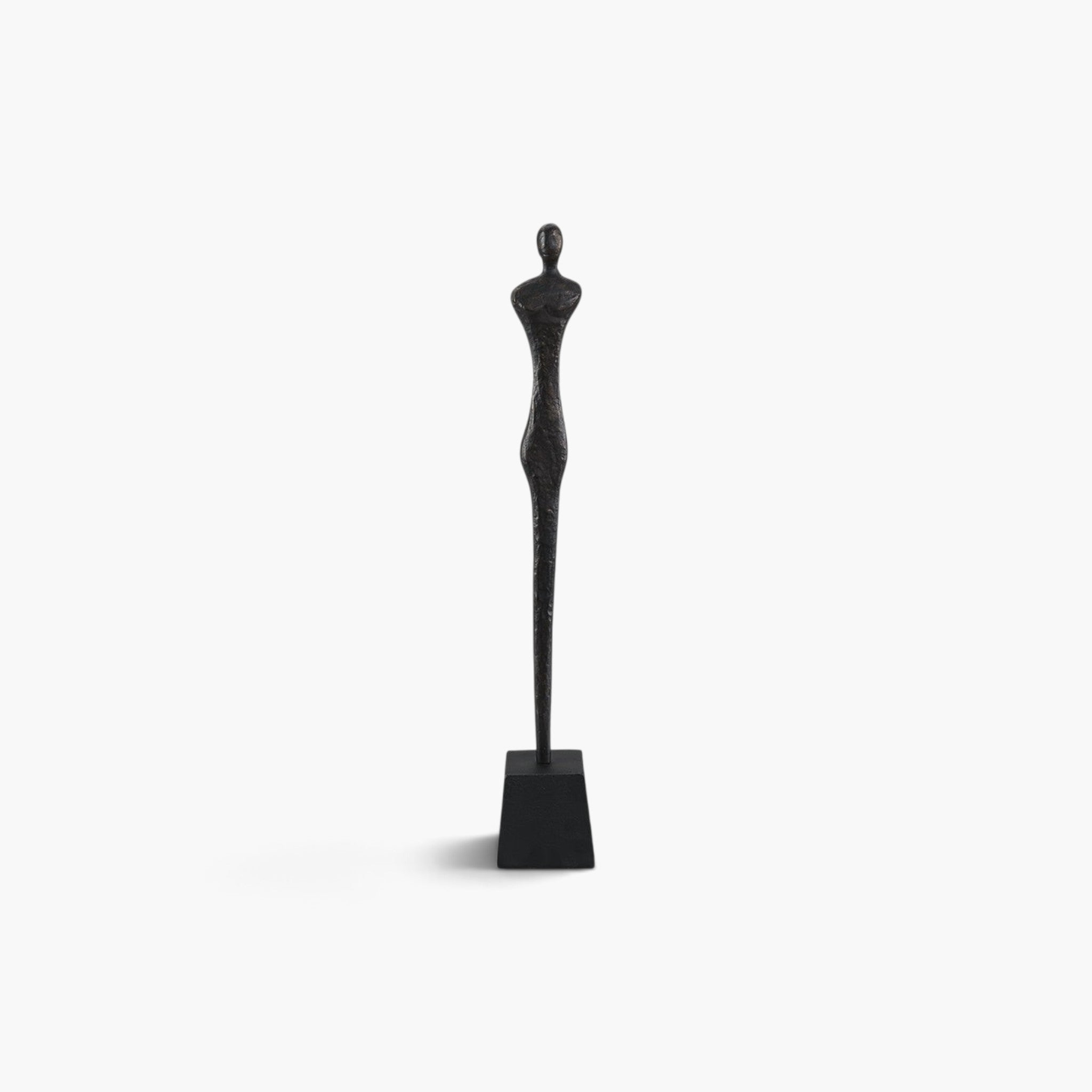 Lyckåsen Donna minimalist female silhouette statue in antique black matte metal with a textured finish.