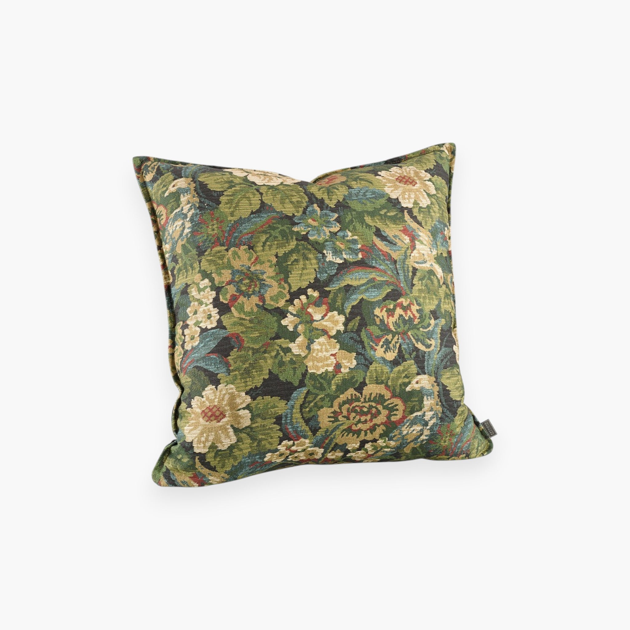 Lyckåsen Ebonleaf Flower cotton cushion cover with a detailed green floral tapestry pattern and decorative fringe.