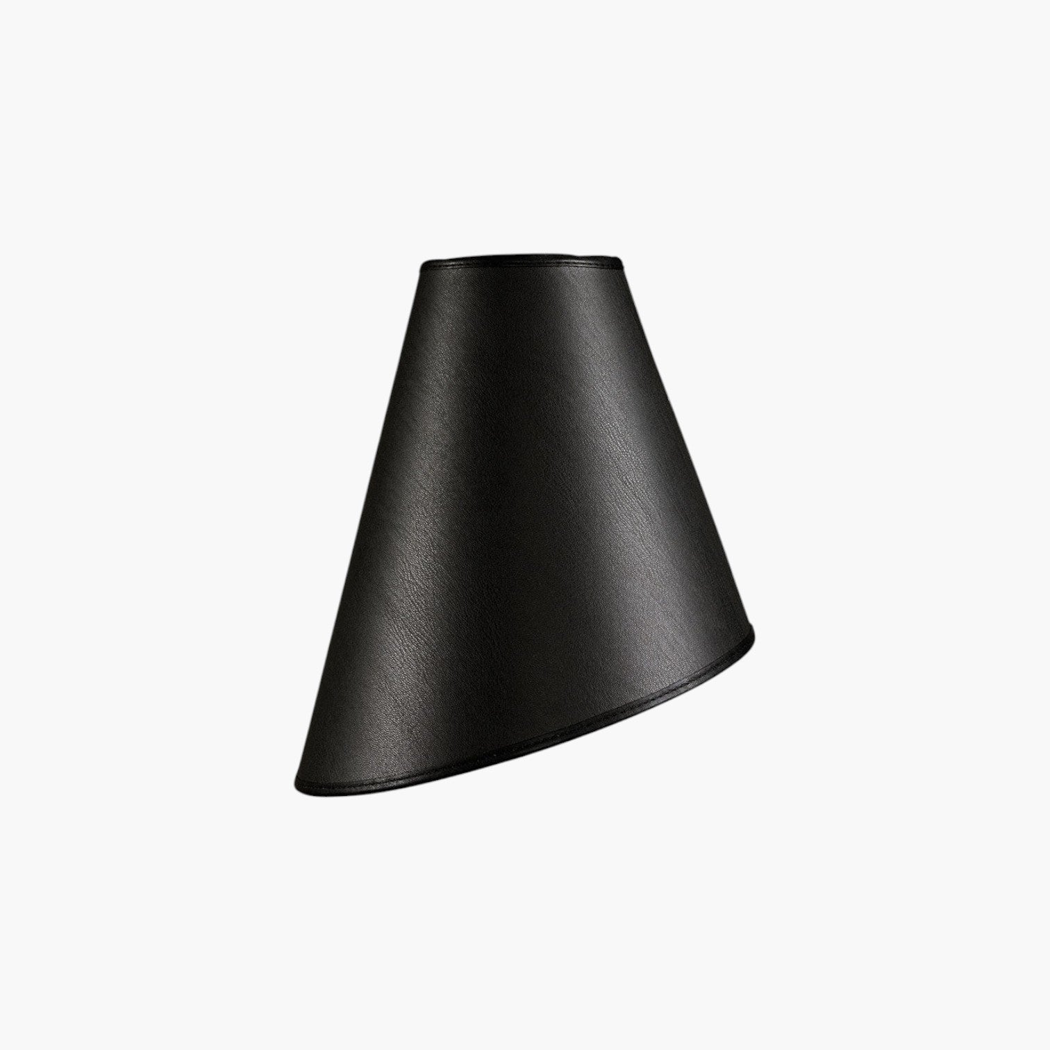 Lyckåsen Shade Cone lampshade in leather ebony featuring a sleek conical design and black stitched edges.