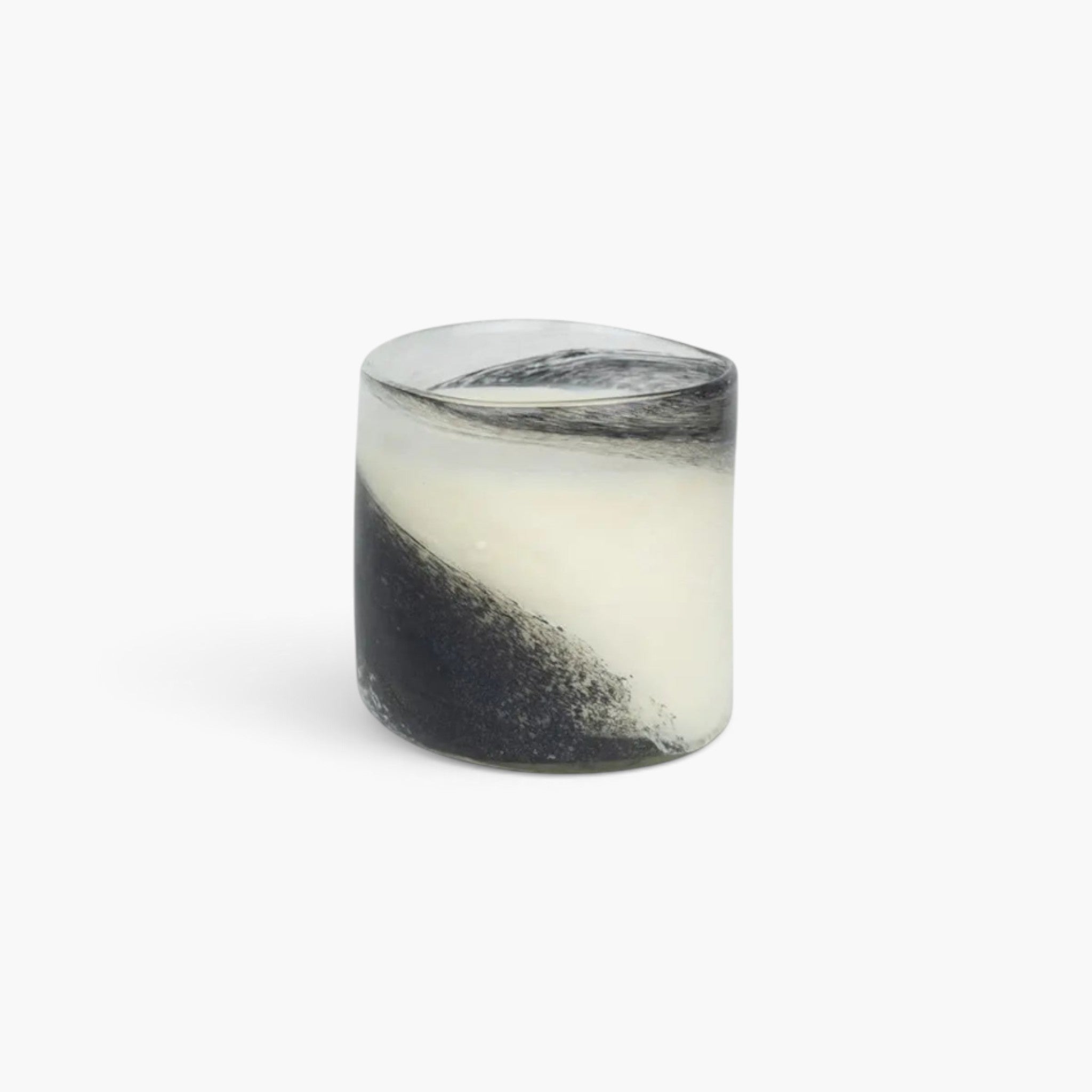 Lyckåsen Lisbon scented candle in a unique, hand-blown black and white swirled glass container.