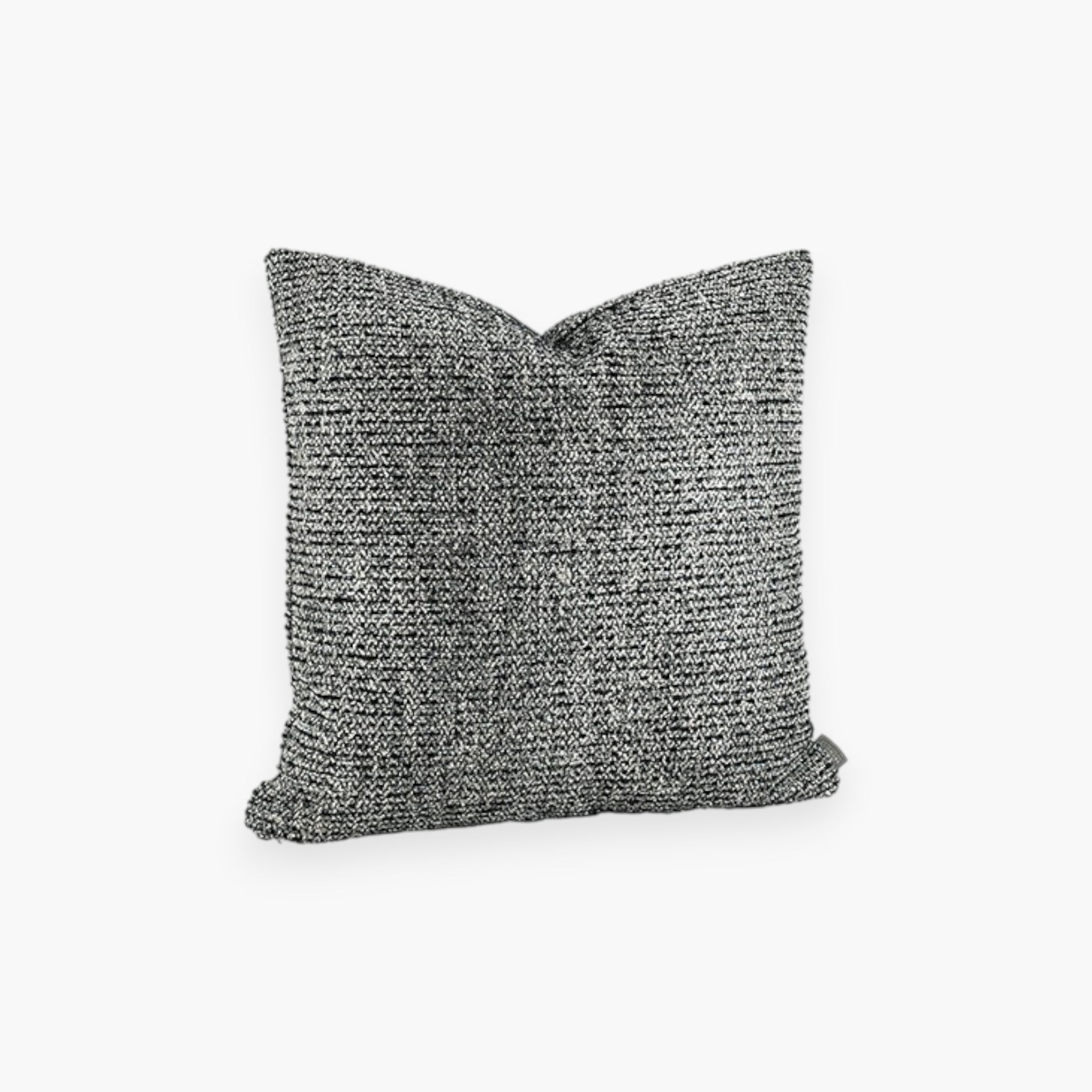 Lyckåsen Nero Bianco woven cushion cover in black with a textured, rustic finish and a hidden zipper closure.