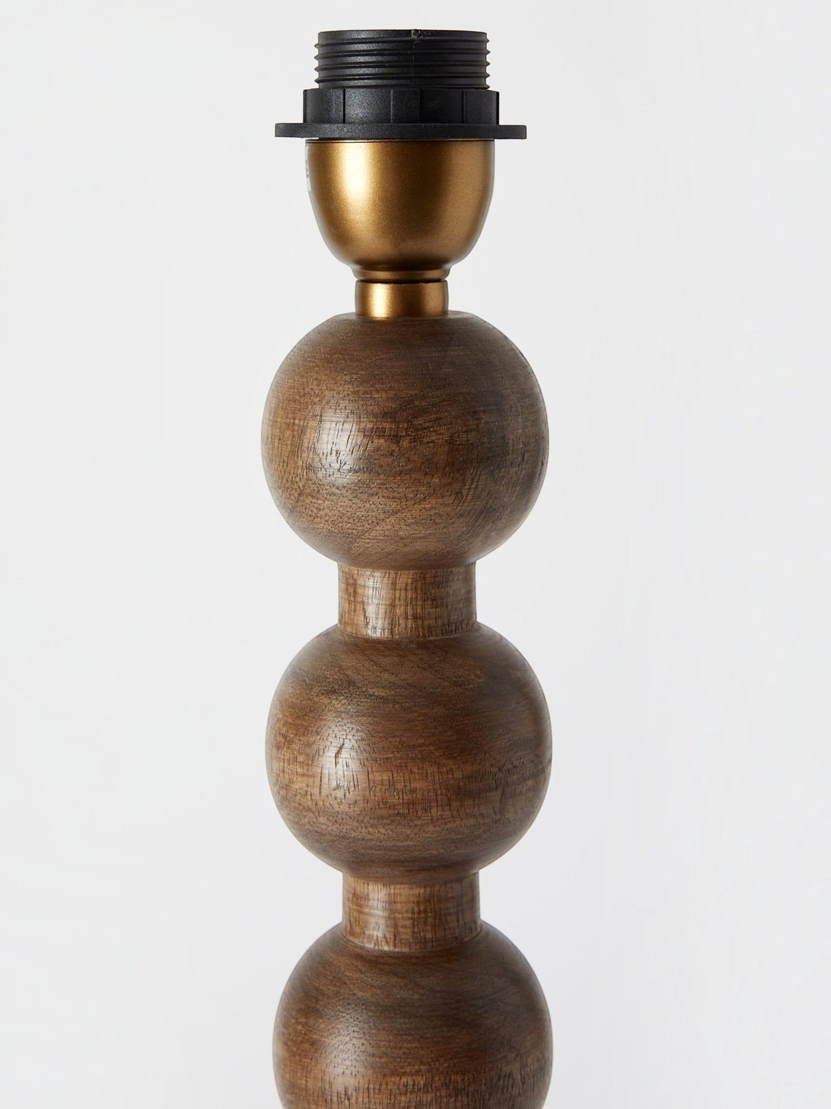 Lyckåsen Qvist 413 table lamp base in warm walnut wood with a stacked spherical design and gold metal accents.