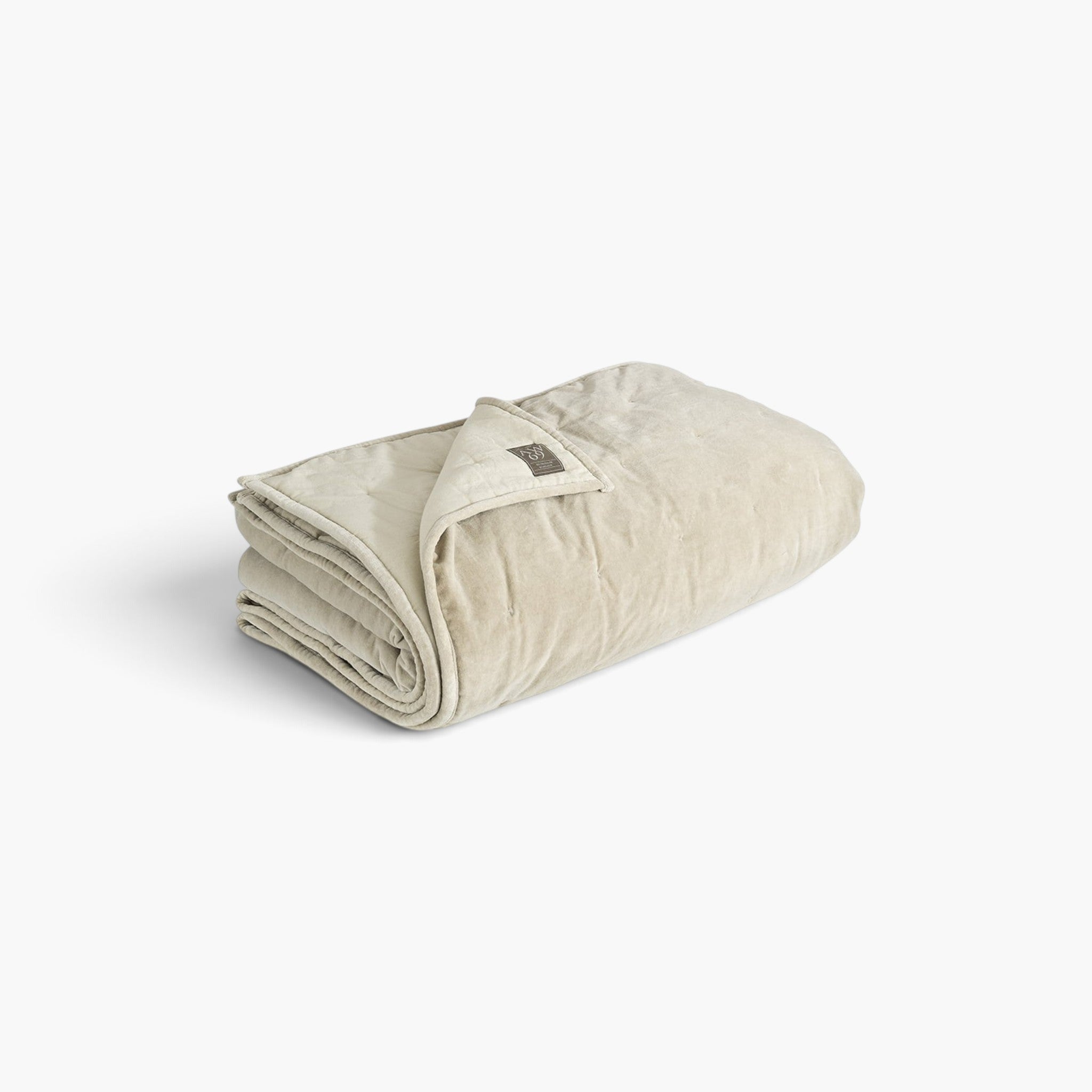 Lyckåsen Santana washed taupe cotton bedspread with quilted cross pattern and soft piped edges.