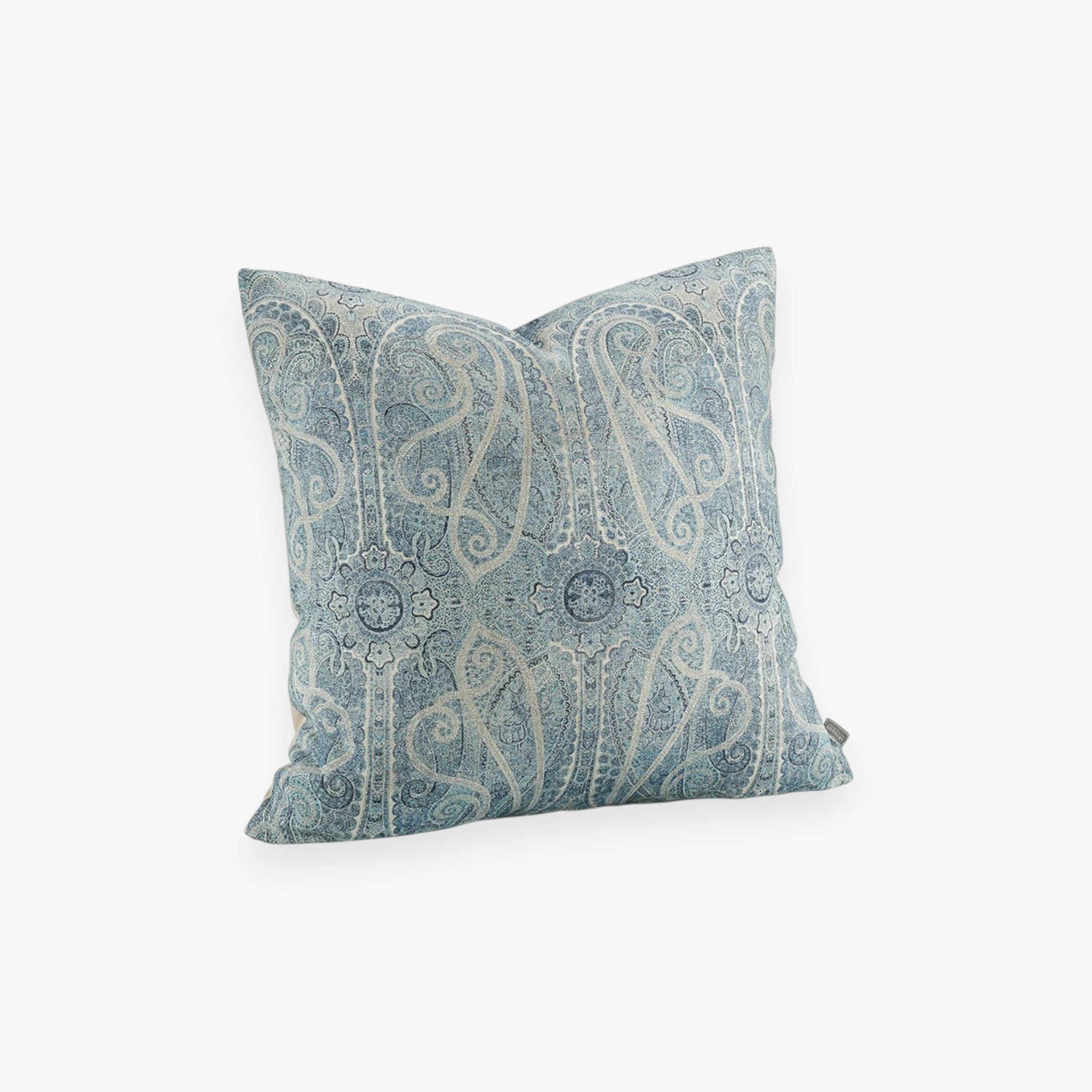 Lyckåsen Sheldon indigo blue paisley patterned cushion cover in a soft linen blend fabric with a hidden zipper.