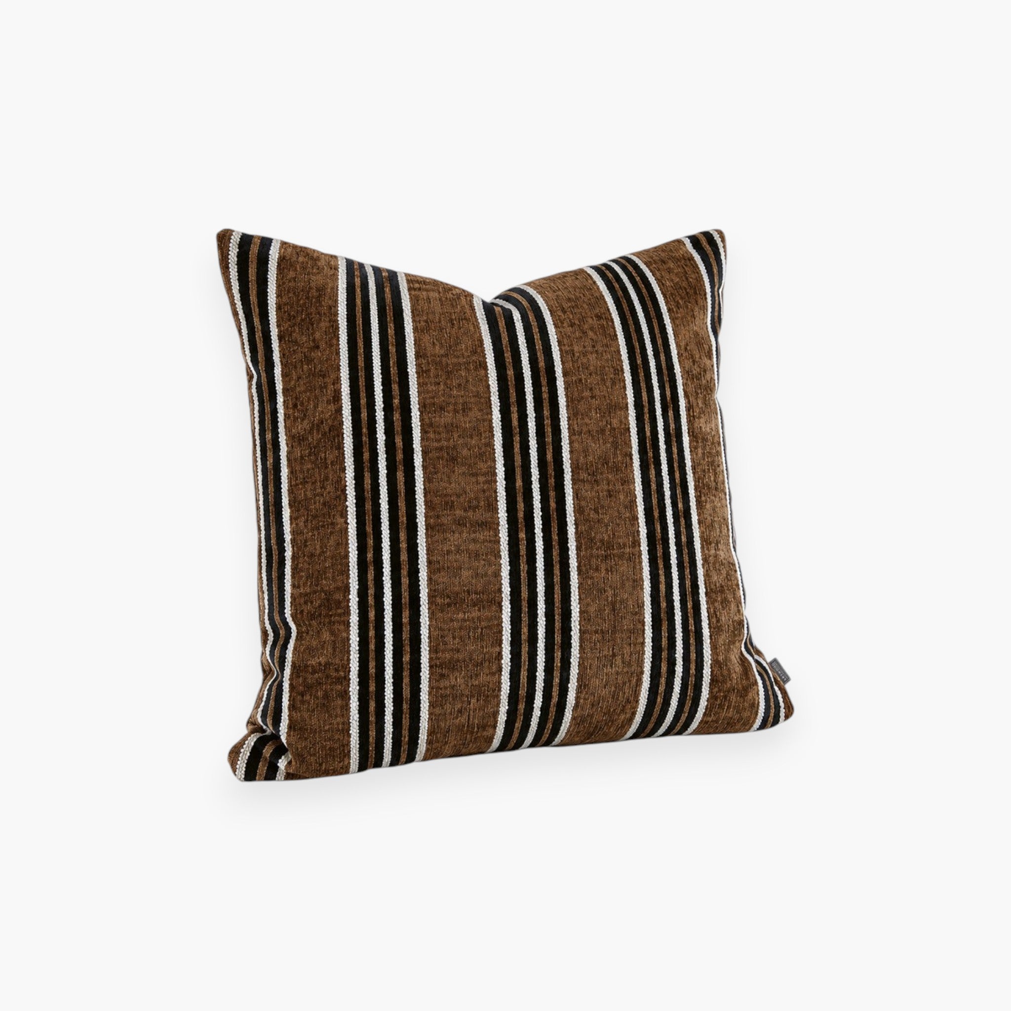 Lyckåsen Stravino decorative cushion cover with brown, black, and white stripes and a soft velvet-like texture.