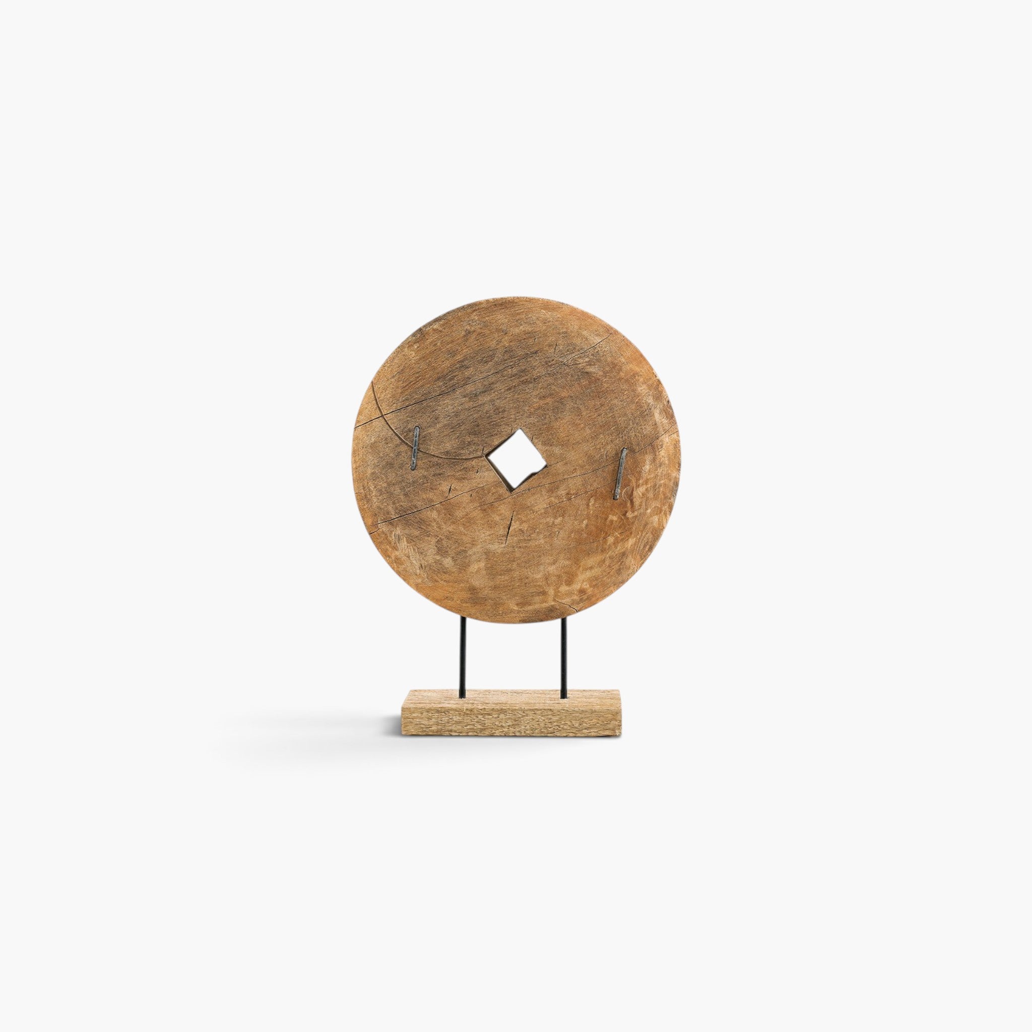 Lyckåsen Troya round brown mango wood sculpture on a stand with a rustic textured finish and central square cutout.