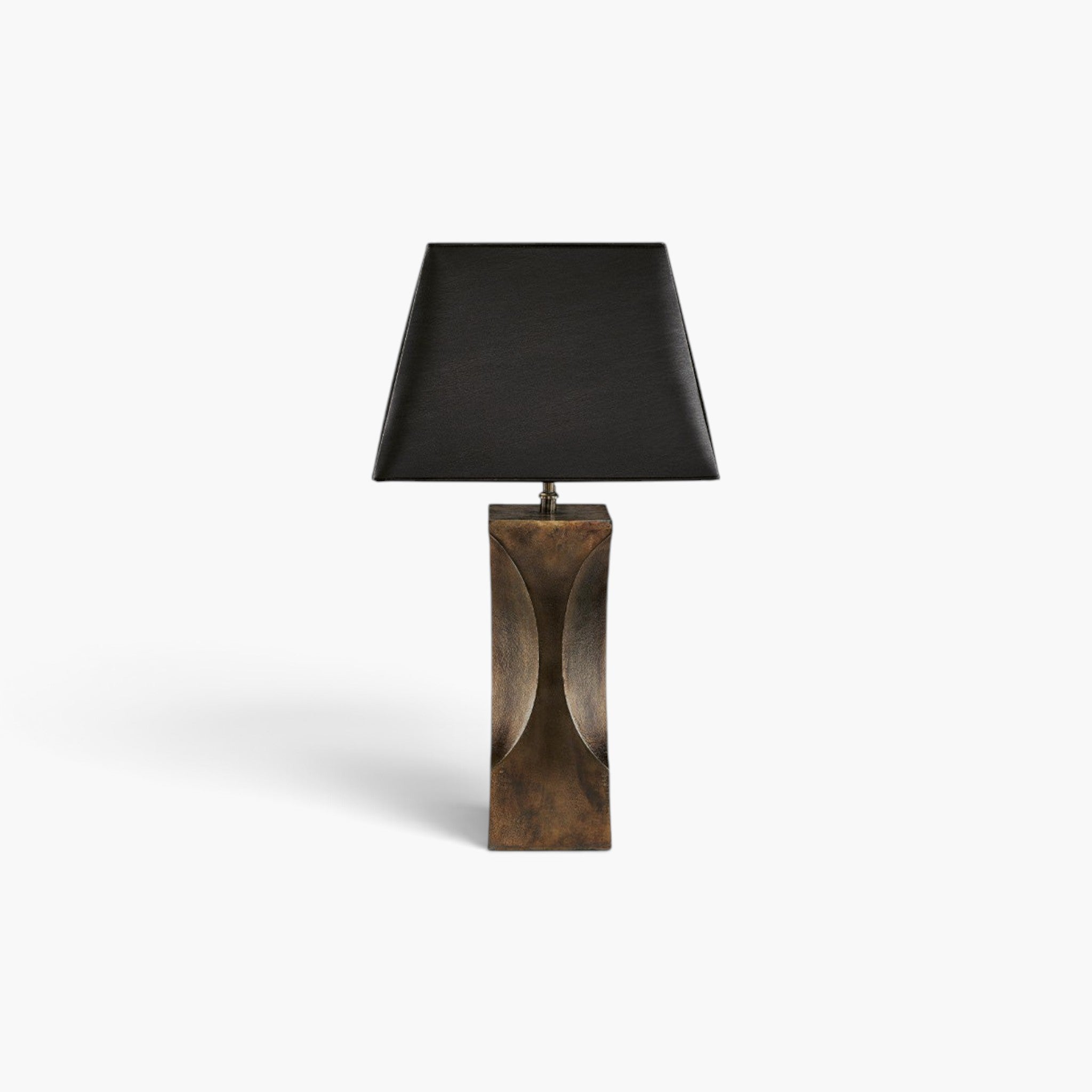 Lyckåsen Vezzani table lamp in antique brass aluminum with a modern sculptural base and a black fabric lampshade.